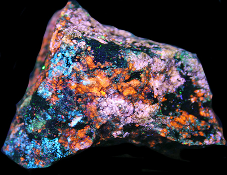 Fluorescent prehnite, pectolite, margarosanite under shortwave UV light Fluorescent prehnite, pectolite, margarosanite under shortwave UV light