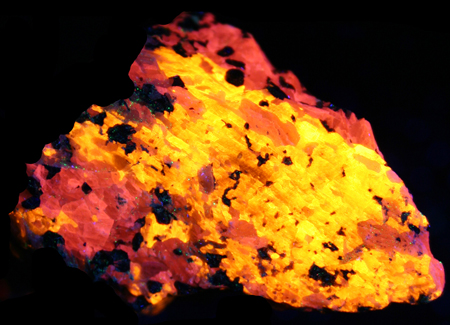 Fluorescent 3rd Find wollastonite in calcite under shortwave UV light
