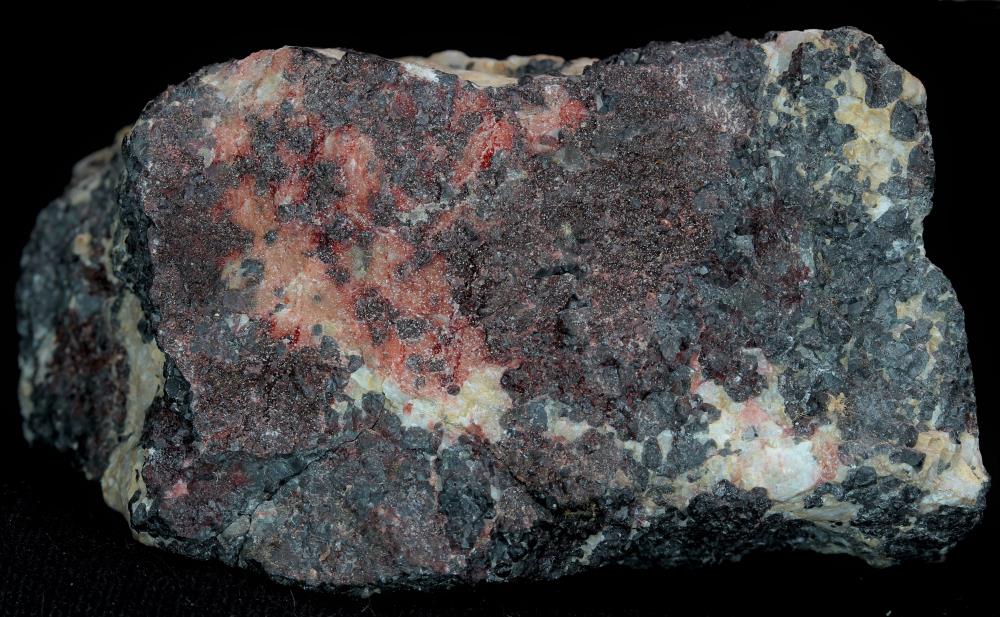 Birnessite, calcite, franklinite, and minor willemite, Sterling Hill Mine, Ogdensburg, NJ