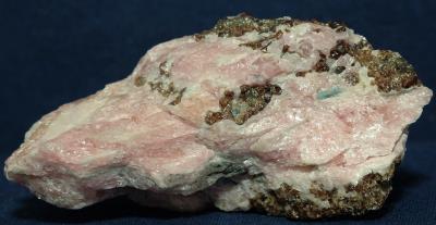 Bustamite, hardystonite, clinohedrite, andradite garnet, willemite and apatite crystal from Franklin, NJ