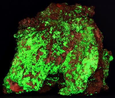 Copper, willemite and calcite from Franklin, NJ. under shortwave UV Light