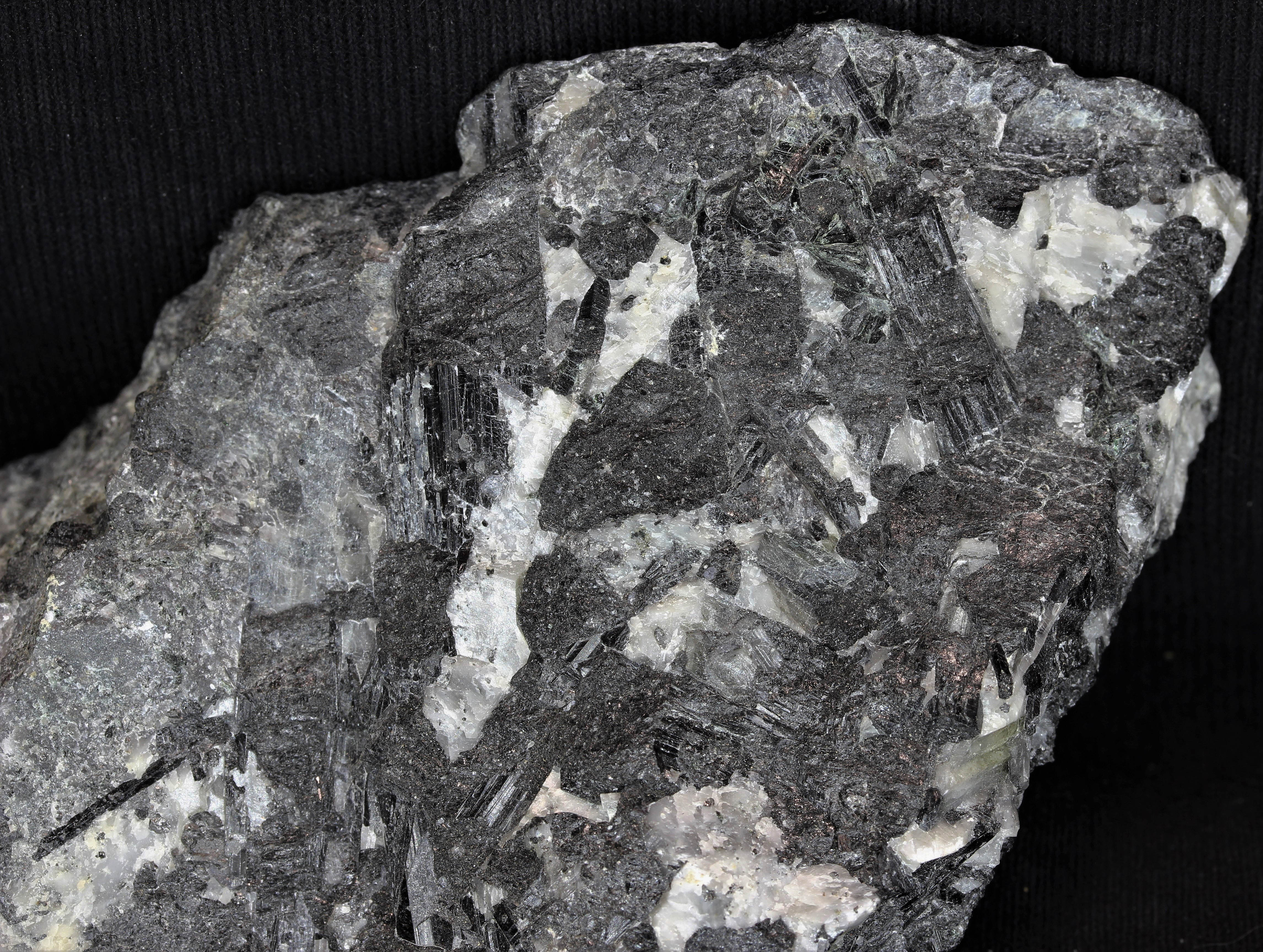 Dravite tourmaline and calcite, Sterling Hill Mine, Ogdensburg, NJ