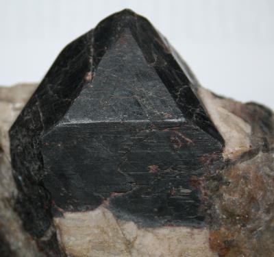 Franklinite crystal in calcite matrix, Sterling Hill Mine