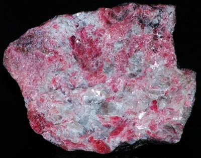Bladed rhodonite, calcite and minor franklinite from Franklin, NJ