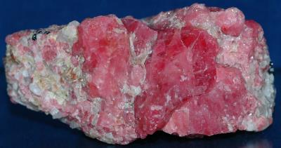 Rhodonite crystals, calcite, willemite and minor franklinite from Franklin, NJ