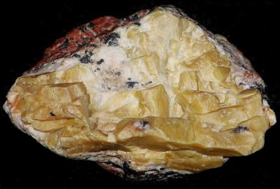Sphalerite, willemite, franklinite and minor calcite, from Franklin, NJ.