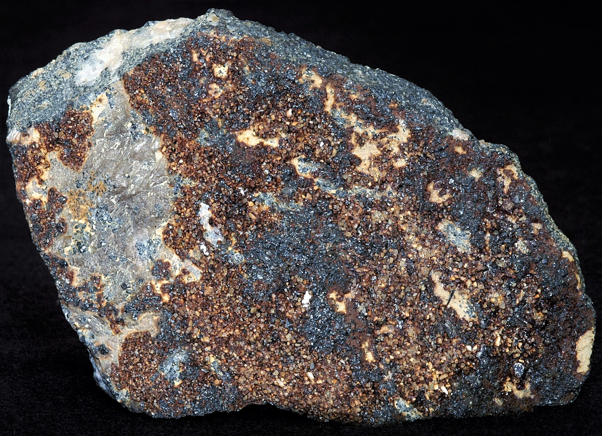 Yukonite, calcite and franklinite from Sterling Hill Mine, Ogdensburg, NJ