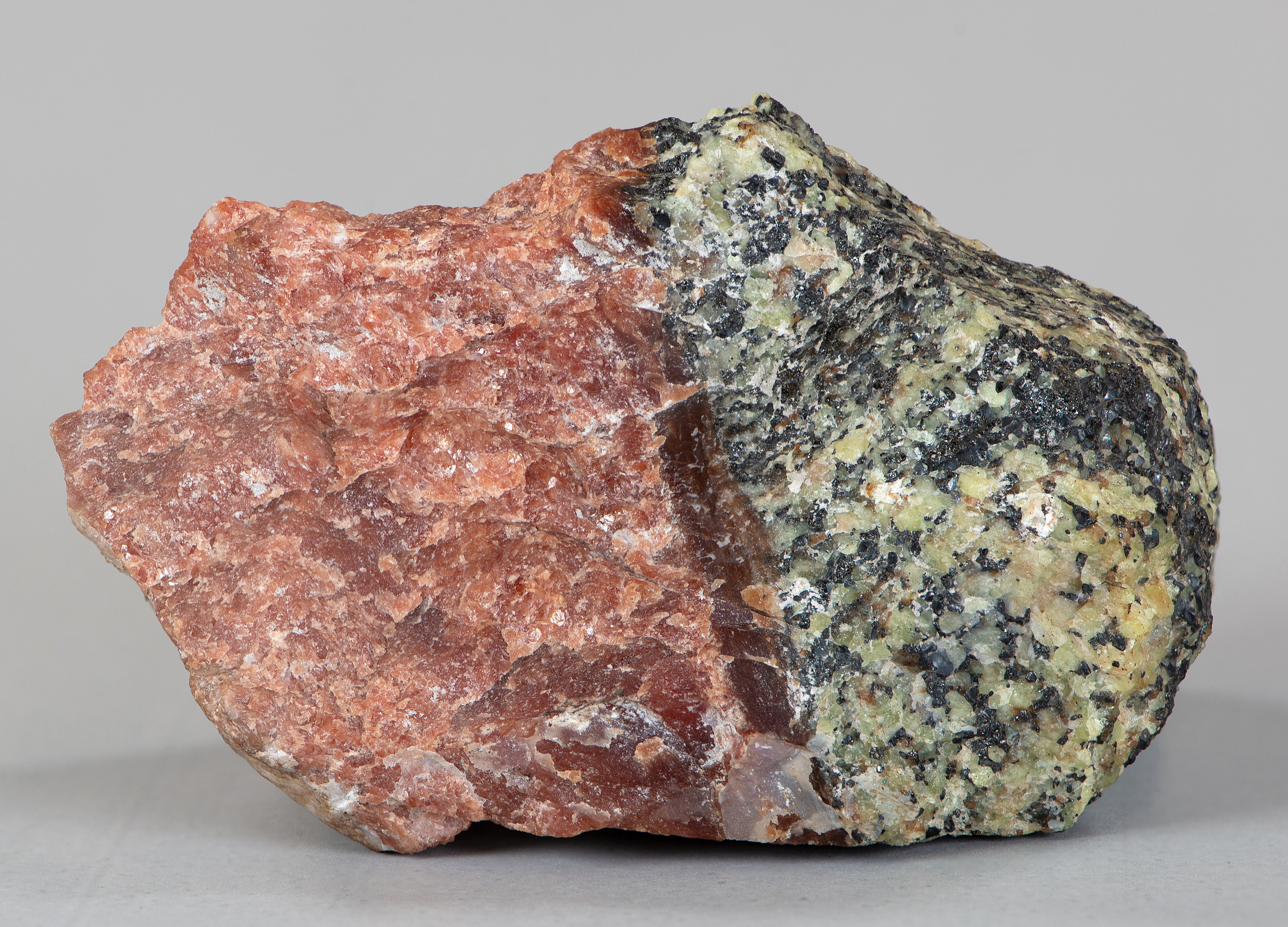 SCH3, red to brownish-red vein schallerite, granular willemite-franklinite ore from Franklin mine, Franklin NJ.